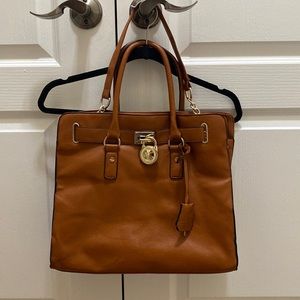 Michael Kors Saffiano Leather Lock Tote. Tan color.